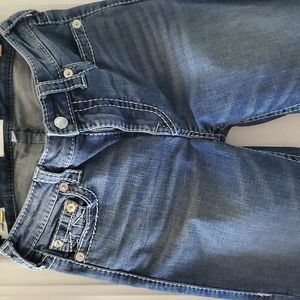True religion trim stitching  in aqua blue makes the butt look plump